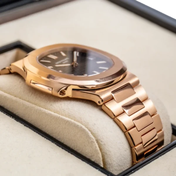 Left - Patek 5711 Nautilus Rose Gold Brown Dial