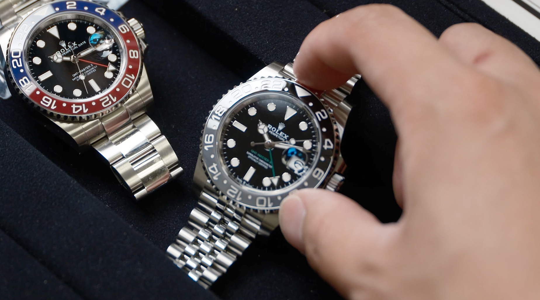 Banner of two GMT Master. One is classic Rolex Pepsi with oyster bracelet and another is 2024 Rolex New Release Bruce Wayne Jubilee(126710GRNR)