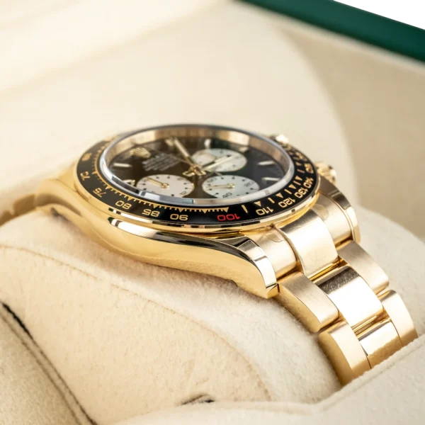 Left - Rolex Daytona Le Mans Yellow Gold 126528LN