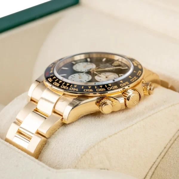 Right - Rolex Daytona Le Mans Yellow Gold 126528LN