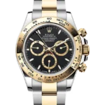 rolex daytona oystersteel yellow gold black dial 126503 close front look