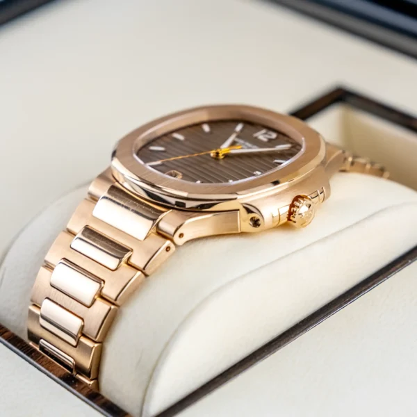 Right - Patek Philippe Nautilus 7118 1R Rose Gold Champagne Lady